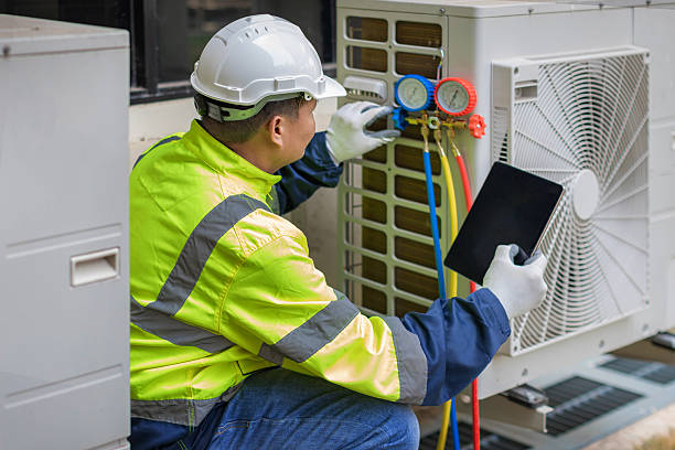 Professional Hvac technician working in Cadiz, OH